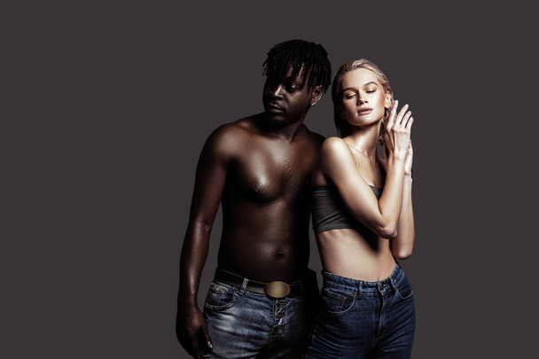 International models wearing jeans posing for fashion magazine - Foto, immagini