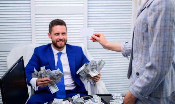 Excited successful businessman opened a box with money and rejoices in profits. Super excited person. Business, people, success and fortune concept. - Foto, Imagem