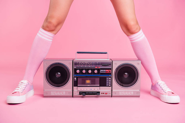 Cropped close up photo skinny perfect ideal she her lady legs opposite standing boom box play between teens hanging out celebrating weekend holiday isolated pink rose background - 写真・画像