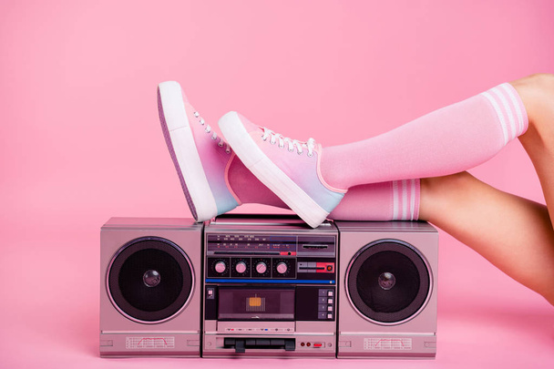Cropped close up photo skinny perfect ideal she her lady legs lying near boom box play on fitness training workout press swing happy glad be in fit soundtrack turned on isolated pink rose background - Photo, image