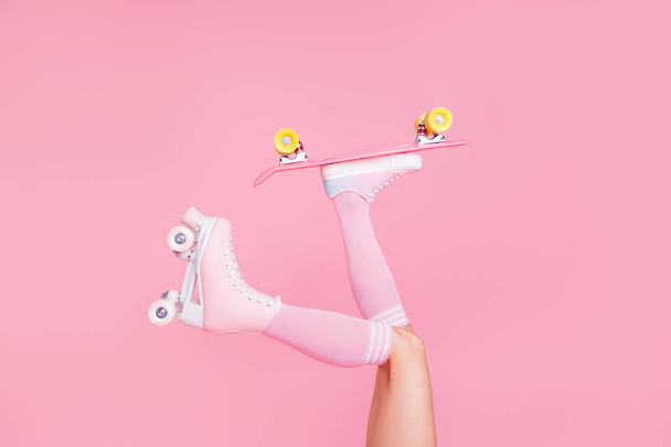 Cropped close up photo skinny perfect ideal she her lady one leg raise up skateboard another rolling in rollers real enthusiast isolated pink rose background - Fotoğraf, Görsel
