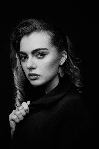  Beautiful Young Woman Posing  in black jacket                 - Zdjęcie, obraz