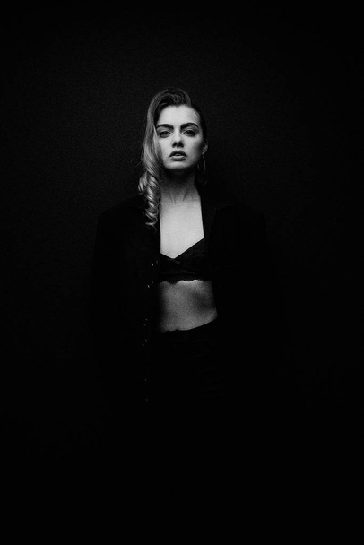 Beautiful Young Woman Posing  in black jacket  and bra - Foto, immagini