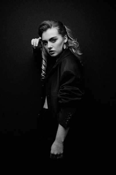  Beautiful Young Woman Posing  in black jacket                 - Photo, Image