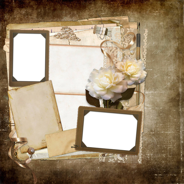 Old vintage photo frames, old cards for text or photo, faded roses, ribbons, vintage jewelry, lace on a worn vintage background - Fotó, kép