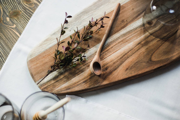 still life, kitchen table, wooden board, vase, honey - Foto, imagen