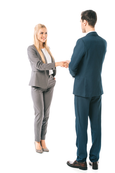 businesspeople in suits shaking hands and making deal isolated on white  - Photo, Image