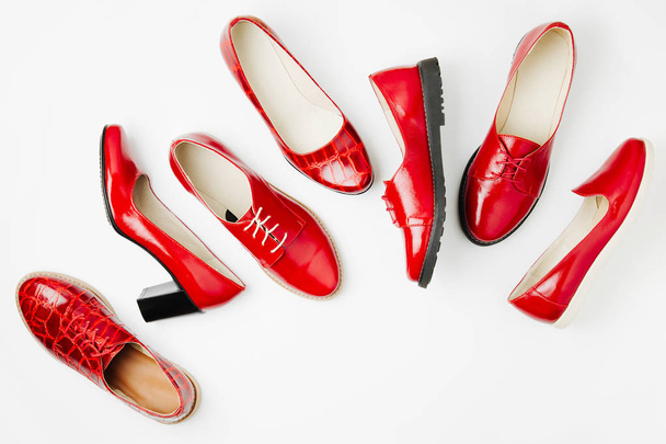 Stylish female spring or autumn shoes in red colors. Beauty and fashion concept. Flat lay, top view - Foto, Imagen