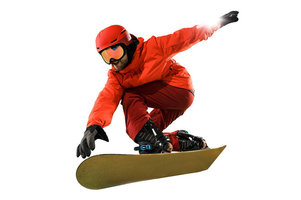 Portrait of young man in sportswear with snowboard isolated on a white background. - Фото, изображение