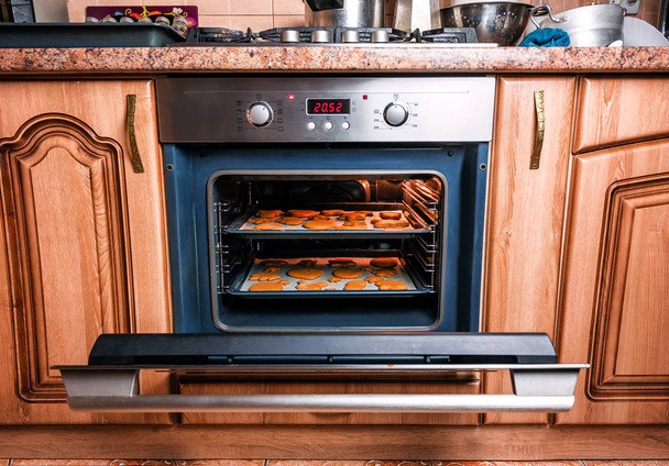delicious gingerbread cookies in the oven - Photo, Image