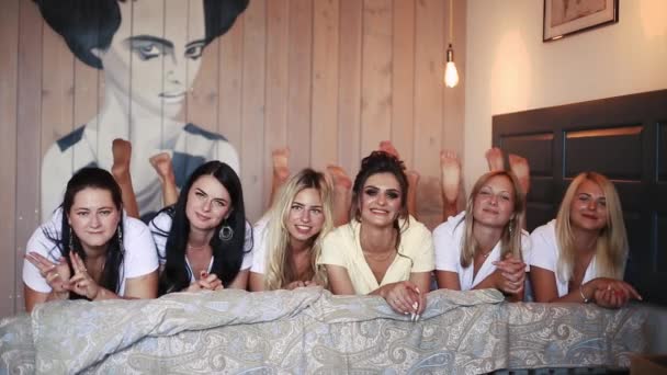 Group of brides mades in bathrobes celebrating hen party in hotel. - Footage, Video
