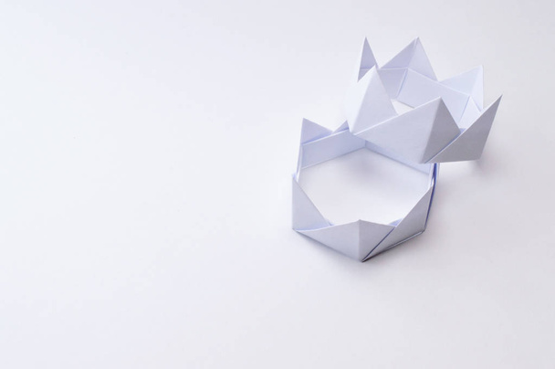 Origami figure paper in white background, ideal for your education projects or origami topics in your publications. - Valokuva, kuva