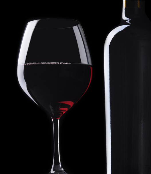 Wine Bottle and Wineglass on Black - 写真・画像