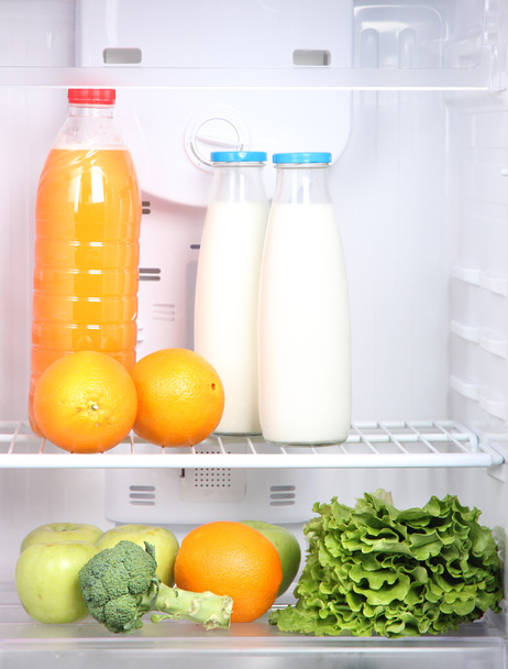 Open refrigerator with vegetarian food - Foto, imagen