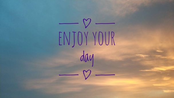 Enjoy your day. Beautiful background image with motivational text.  - Photo, Image