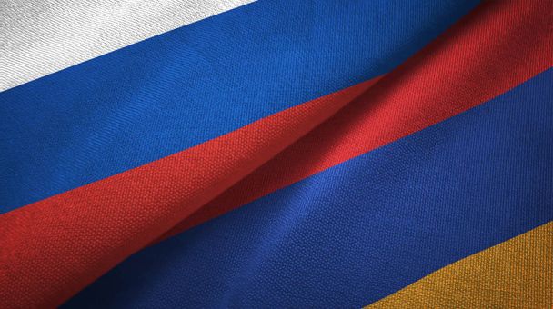 Rusland en Armenië vlaggen samen betrekkingen textiel doek, stof textuur - Foto, afbeelding