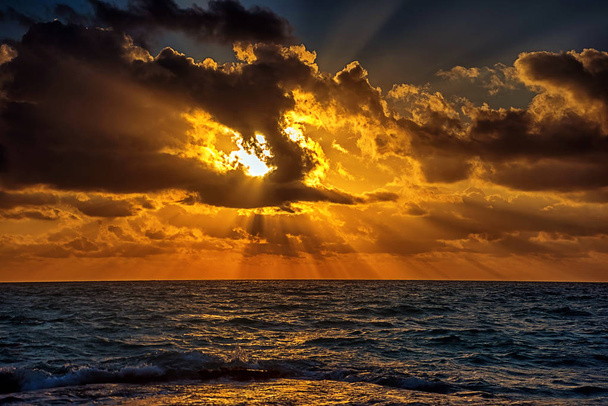 Sunset on the Caribbean Sea. Clear sky with small clouds. Clear weather. - Photo, Image