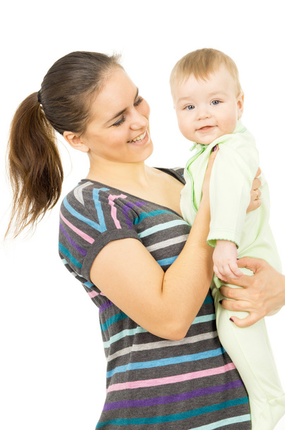 uma mãe feliz segurando as mãos de seu bebê
 - Foto, Imagem