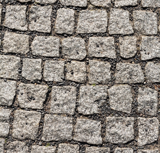 velho padrão de pedra calçada na rua
 - Foto, Imagem