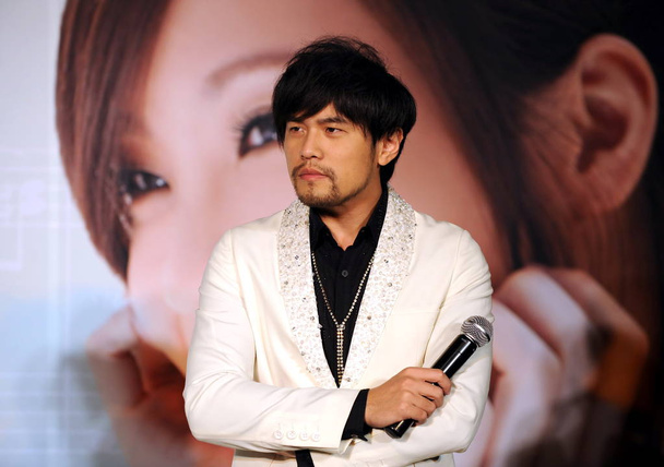 Taiwanese singer Jay Chou poses during a promotional event for Taiwanese singer Cindy Yens new album in Beijing, China, January 27, 2010. - Zdjęcie, obraz