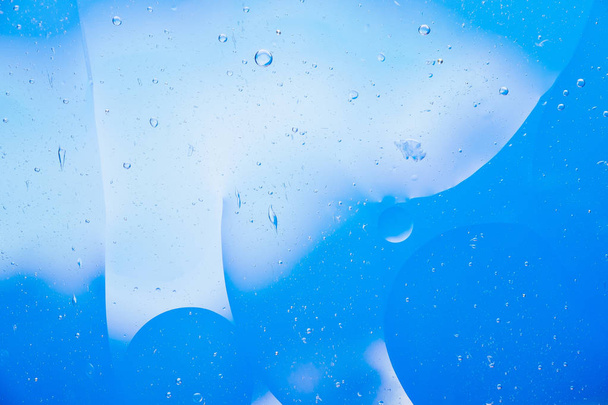 Water oil bubble macro abstract background flow liquid blue aqua white colors - Photo, Image