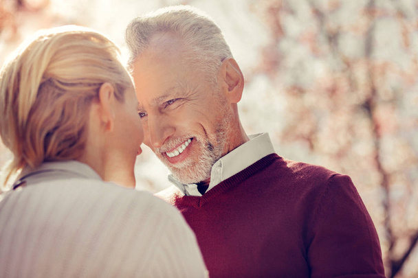 Delighted mature male feeling happiness with his wife - Fotoğraf, Görsel