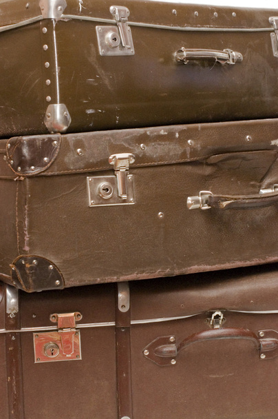 Heap of old suitcases isolated on white - Valokuva, kuva