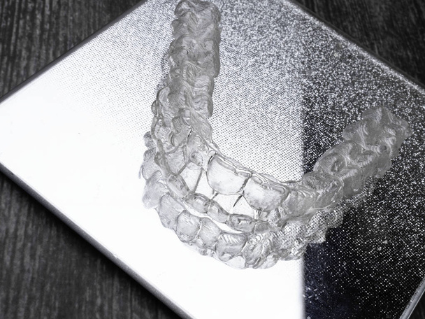 Inivisalign braces or aligner. A way to have a beautiful smile and white teeth. - Фото, зображення