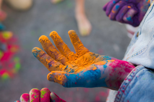 Three hands with multicolor dry hawley paint - Fotoğraf, Görsel