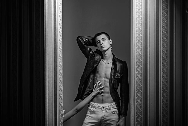Confident and successful. Male fashion and style. Fashion portrait of man. Macho man with six pack. Sexy muscular man. girl touch his belly with hand. Stylish and confident - Photo, Image