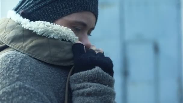 Poor woman in dirty clothes feeling cold, homeless lifestyle, hopelessness - Video
