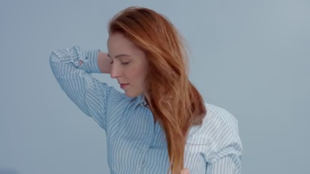 gingerhead red hair, ginger hair model with blue eyes on blue background - Footage, Video