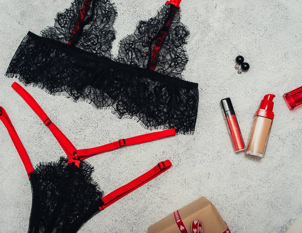 lace lingerie and festive gift box on background, st valentine day concept  - Foto, afbeelding