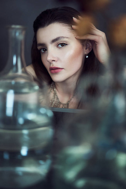 Beauty portrait of girl with water and reflections. Hight quality retouching photo. Fashion model - Foto, afbeelding