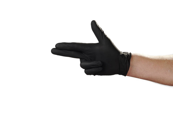 Hand shows gesture, good advertisement for security agency. Glove. - Photo, Image