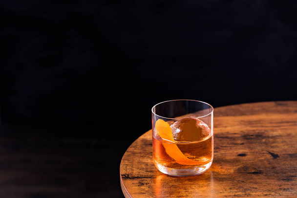 Refreshing Bourbon Old Fashioned Cocktail on a Table - 写真・画像