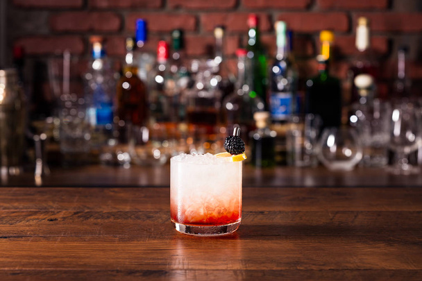 Refreshing Blackberry Gin Bramble on a Bar - Photo, image