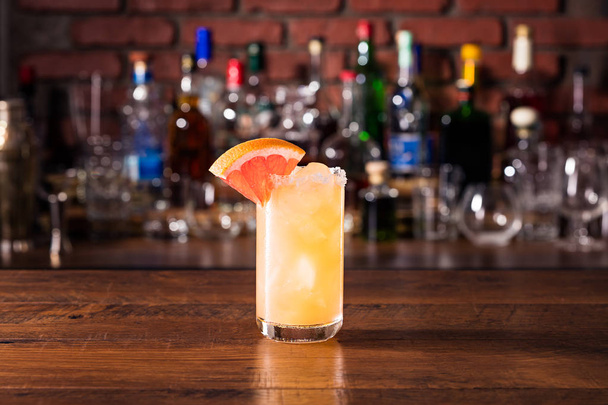 Refreshing Tequila Paloma Cocktail on a Bar - Фото, зображення