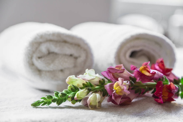 Textile towels with flower isolated on white - Φωτογραφία, εικόνα