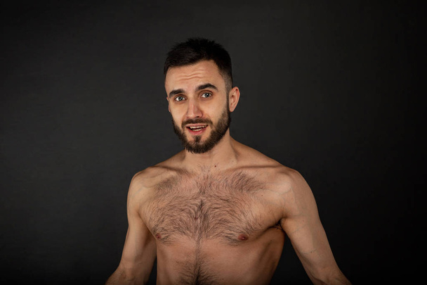 Beauty portrait of half naked smiling young man - Photo, image