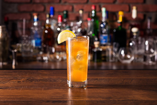 Long Island Iced Tea Cocktail on a Bar - Фото, зображення