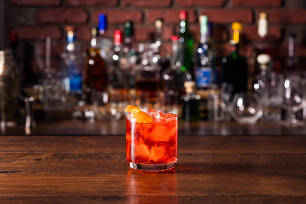 Refreshing Gin Negroni Cocktail on a Table - 写真・画像