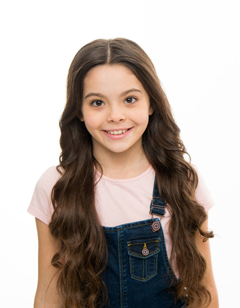 Natural beauty. Girls usually let their hair grow long. Healthy and shiny hair. Kid cute child with long adorable hairstyle. Hair care tips and professional treatment. Long hair feminine attribute. - Foto, imagen