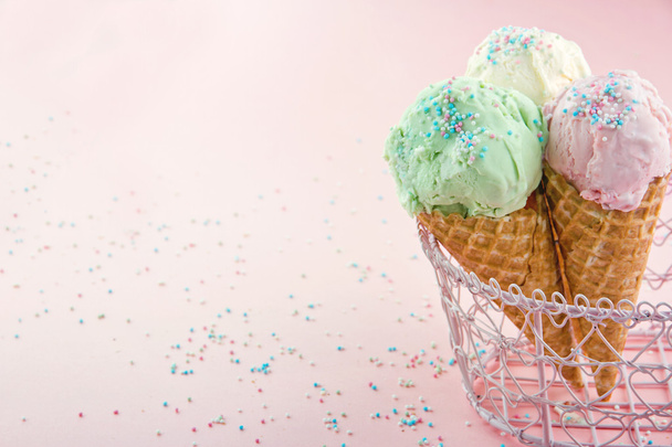 Ice cream cones in on pink background - Photo, image