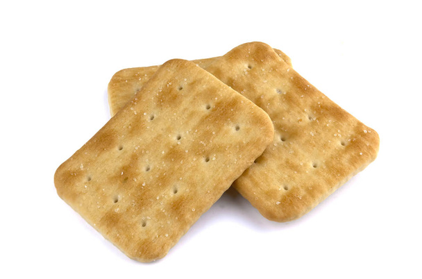 Biscotti cracker a secco isolati su sfondo bianco, concetto di cibo - Foto, immagini