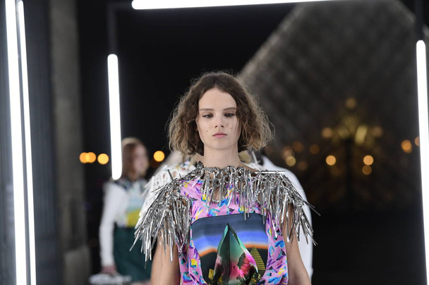 PARIS, FRANCE - OCTOBER 02: Models walk the runway finale during the Louis Vuitton show as part of the Paris Fashion Week Womenswear Spring/Summer 2019 on October 2, 2018 in Paris, France.  - Fotó, kép