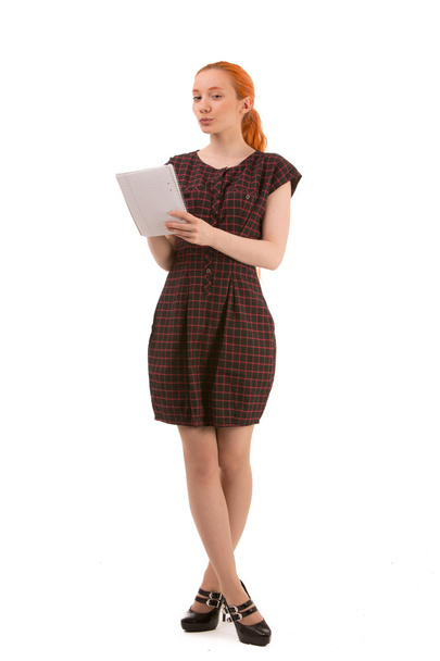 Young woman standing writing - Zdjęcie, obraz