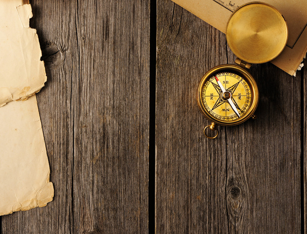Antique compass over wooden background - Foto, Imagem