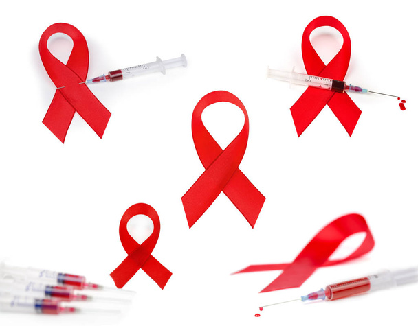 Czerwona wstążka Aids strzykawki i kropla krwi na białym tle - Zdjęcie, obraz