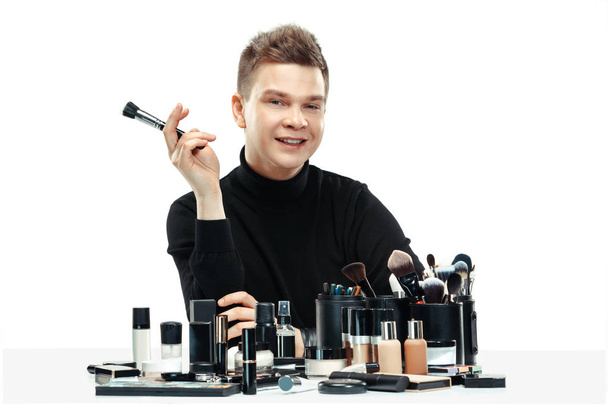 Professional makeup artist isolated on white - Fotografie, Obrázek